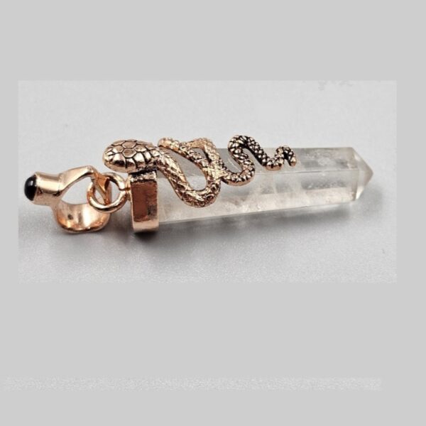 snake on quartz pendant with garnet on the bale without a chain